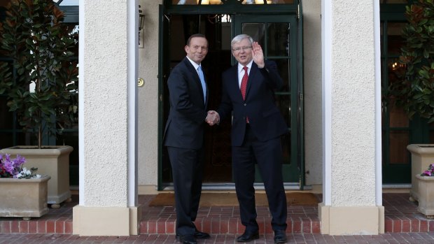 Former prime minister Kevin Rudd greets then Prime Minister-elect Tony Abbott at The Lodge.