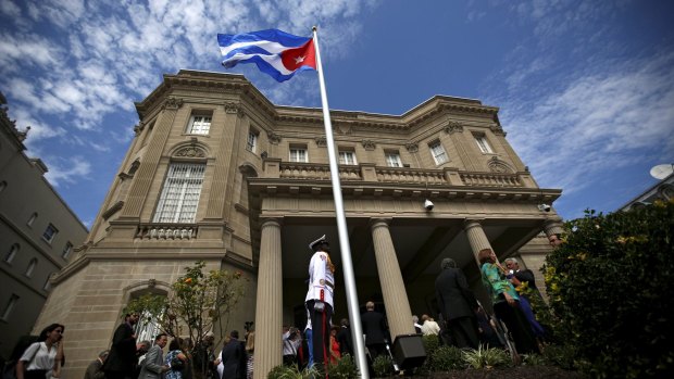A guard stands in front of the new Cuban embassy in Washington.