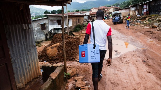 Workers conduct a cholera vaccination campaign in the Freetown neighbourhood of Kaningo.  