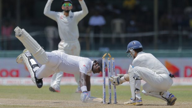 Sri Lanka's captain Angelo Mathews narrowly survives being run out against India in September.