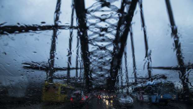 Traffic slowed to a standstill across the city, with rain causing heavy delays.