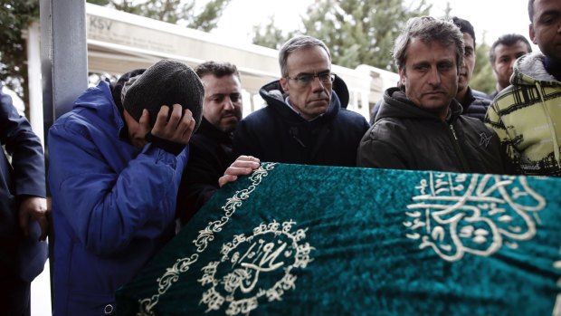 Friends and people attend funeral prayers a 23-year-old Syrian tour guide living in Turkey, a victim of the nightclub New Year's Day attack in Istanbul.