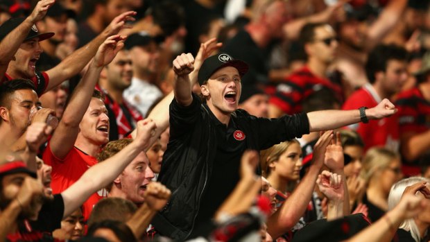 Wanderers fans celebrate a goal during the A-League Semi Final match between the Western Sydney Wanderers and the Brisbane Roar.