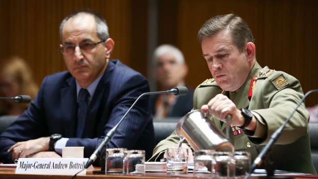 Major-General Andrew Bottrell (right), of Operation Sovereign Borders, at the hearing.