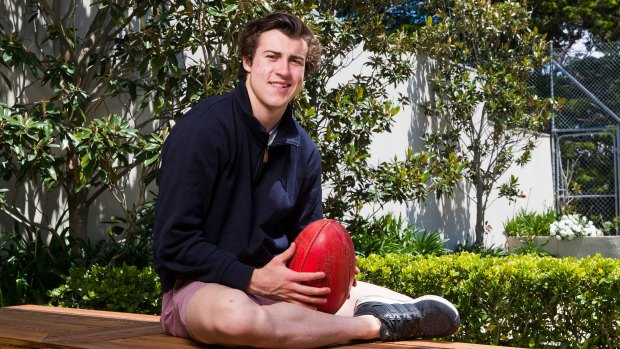Top draft pick, Essendon's 18-year-old Andy McGrath. Young footballers need life experience, say senior AFL figures.