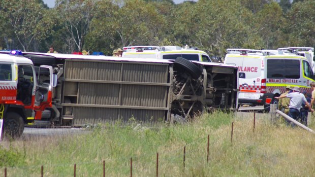 The bus, carrying 50 ADFA personnel, rolled over, leaving 30 injured, four seriously.