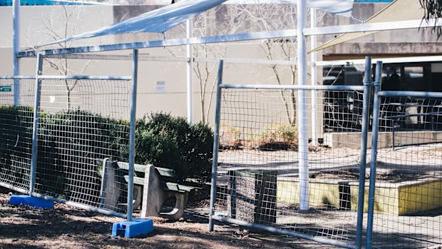 A gap in the back fence at the former CSIRO headquarters on Thursday.