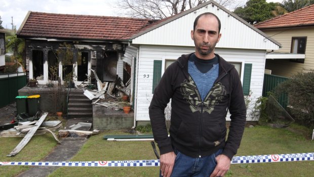 Gutted: Alex Haddad stands outside his investment property in Sydney's Ryde that was destroyed by fire.