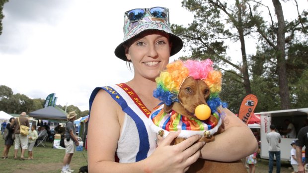 Sarah McCreath, of Bonython ,with her dog Snags that won both the Werriwa Wiener Dash race and the Dapper Dachshund costume event at the Bungendore show.  