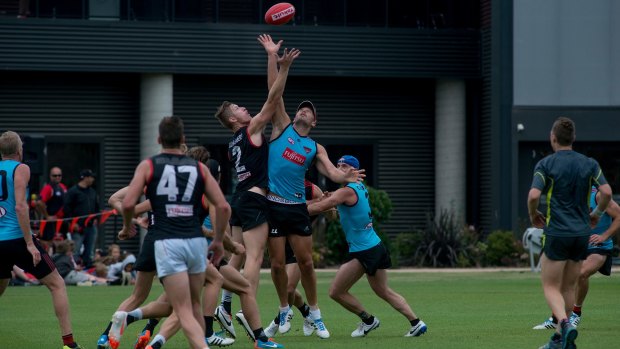 Back on track: Bombers players at pre-season training on Tuesday. 