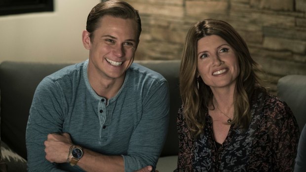 Billy Magnussen, left, and Sharon Horgan in a scene from  Game Night.