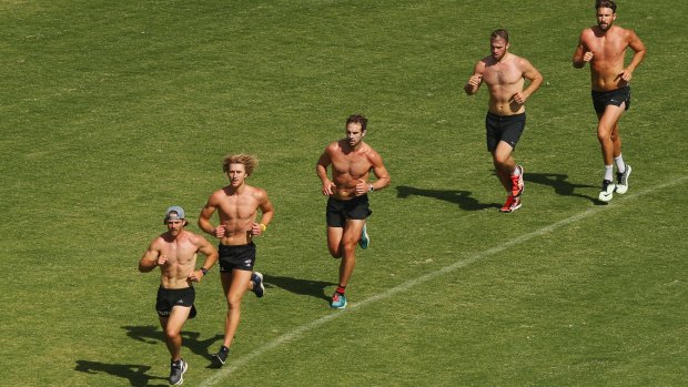 Suspended Essendon players training last month.