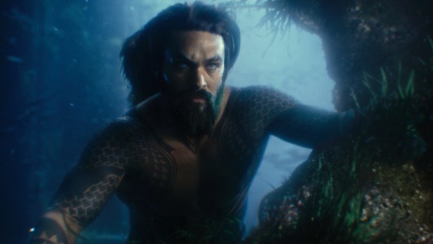 Aquaman (Jason Momoa) provides back-up muscle.