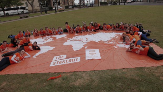 About 50 young Australians gathered in Queens Park on Sunday to highlight recent cuts to foreign aid.