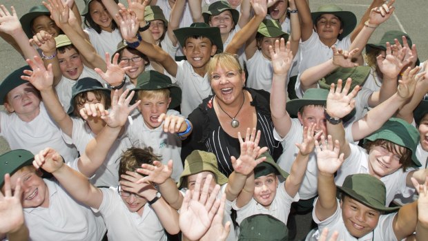 Acting Farrer primary principal Linda Heath with students celebrating the school's jump in the NAPLAN tables.