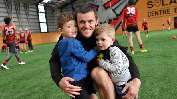 Brent Stanton with his sons Aiden (right) and Connor.