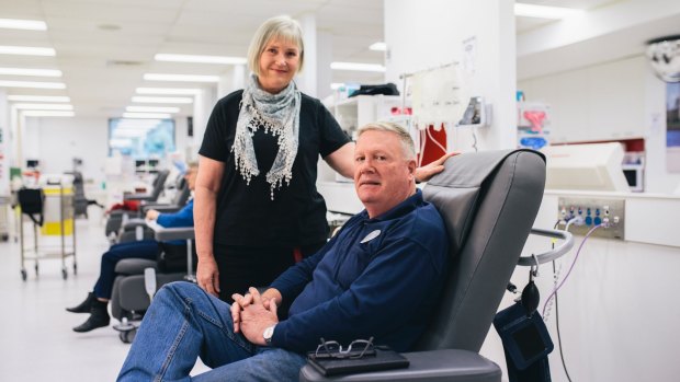 Elizabeth and Michael Taarnby donating blood at the Red Cross. They have O positive and O negative blood types respectively.