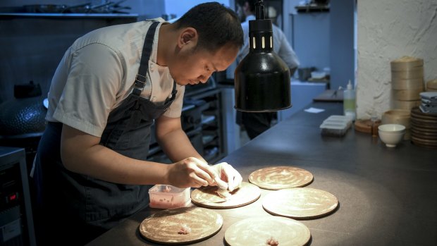 Chef-owner Mo Zhou plating up.
