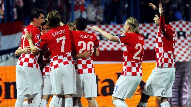 Croatian players celebrate one of their 6 goals.