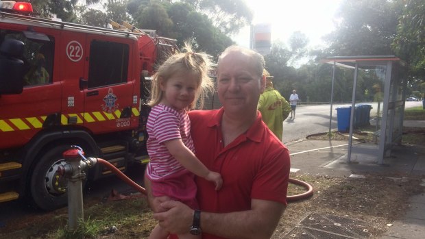Park Road resident Steve with his daughter Emily, 4, rushed home from work when he got the emergency warning.