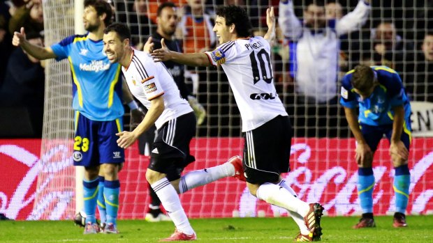 Javi Fuego celebrates his goal with Dani Parejo.
