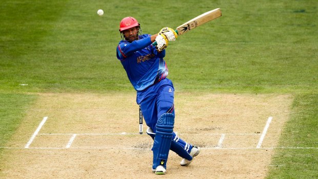 Mirwais Ashraf of Afghanistan puts one away against Sri Lanka at University Oval in Dunedin.  