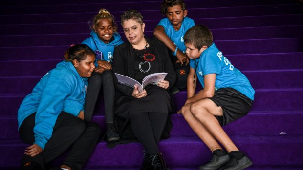 Deborah Cheetham with students Naomi Felton, Rianna Hogan, Dean Bonney and Gary Tucker celebrate Indigenous Literacy Day at the Sydney Opera House.