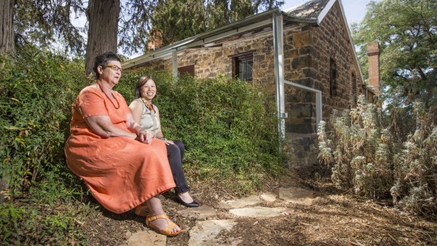 National Capital Authority strategic marketing manager Pam Owen and National Capital Authority heritage manager Anna Wong at Blundells Cottage in Parkes. 