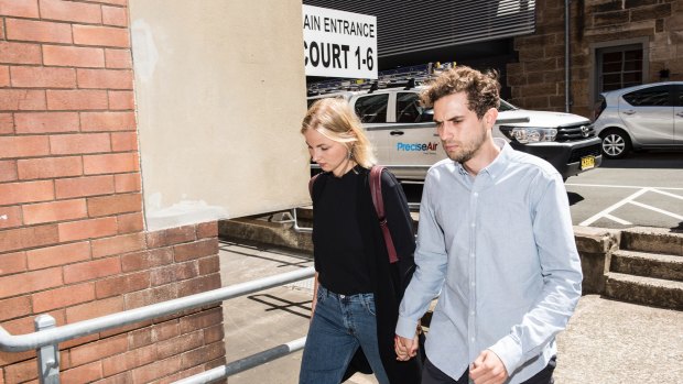 Edward Cameron entering court with his girlfriend. 