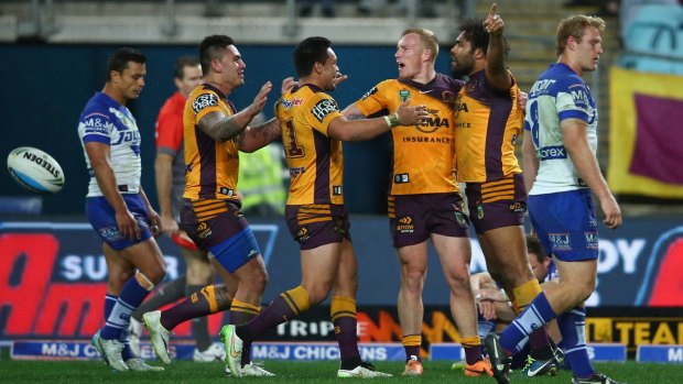 Riding high at the top: The Brisbane Broncos.
