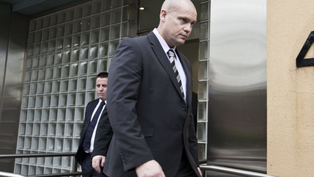 Stray bullet: Senior Constable David Roberts leaves the Coroners Court.