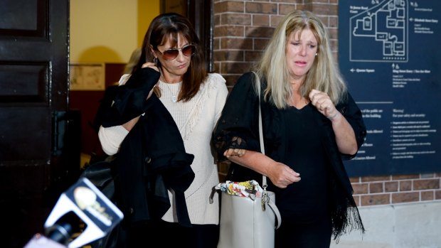 Two of the victims' mothers, Leanne Shanahan and Georgina Sawyer, emerge from court after Jordan Brown was sentenced. 
