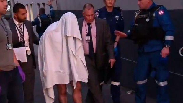 A man arrested at a home in Surry Hills remained in hospital with head injuries.