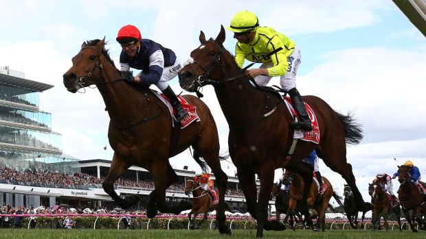 First Tuesday in DEcember anyone? 2016 Melbourne Cup winner Kerrin McEvoy (red cap) on  Almandin.