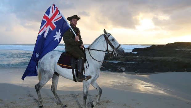 A member of the Mudgeeraba light horse troop takes part in the Currumbin RSL dawn service in 2016. 
