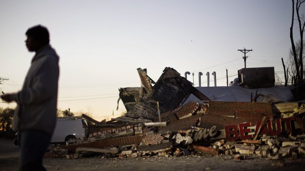 The rubble of a burned-down beauty parlour in Ferguson, Missouri.