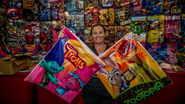 Showbag seller from Parkes, Megan Brown with two of her most popular bags. Trolls and Zootopia.