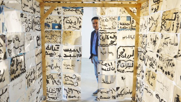 Abdul Karim Hekmat at the door of Rushdi Anwar's work, The Notion of Place and Displacement.