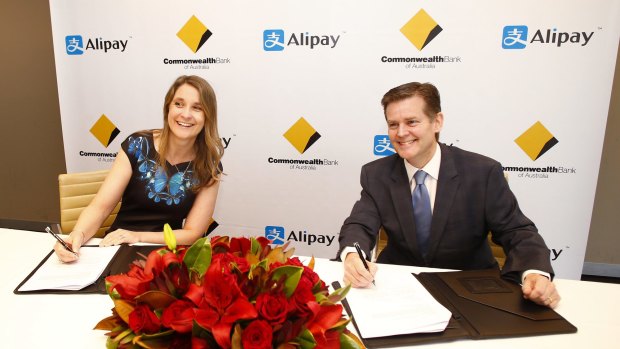 Kelly Bayer Rosmarin, group executive for institutional banking and markets at CBA, and Douglas Feagin, senior vice-president at Ant Financial Services, operator of Alipay, in Sydney last week.