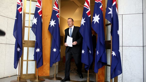 Prime Minister Tony Abbott arrives for the announcement at Parliament House on Monday May 25. 