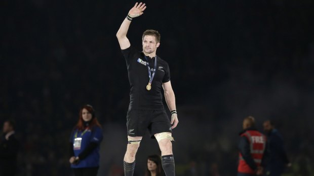 Farewell? New Zealand's captain Richie McCaw waves after getting his winners medal.
