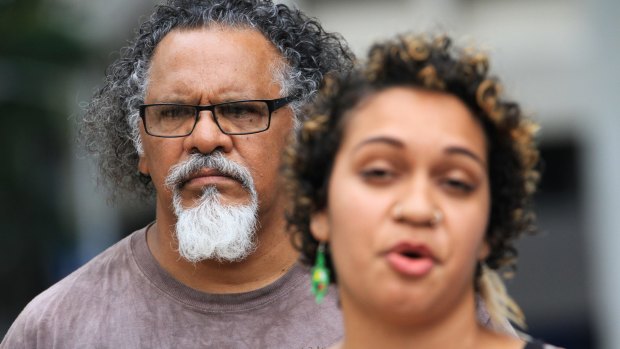 Wangan and Jagalingou traditional owner and council spokesperson Adrian Burragubba and his niece, Murrawah Johnson, speak outside the Brisbane Supreme Court after launching the challenge to the Adani Carmichael mine.