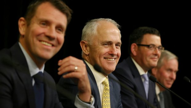 Premier Mike Baird (left) has called for reform of political donations, a request that Prime Minister Malcolm Turnbull (centre) has so far ignored.