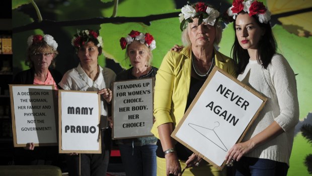 Canberra Polish women are against a new bill to ban abortion in Poland. Mother and daughter, Dana, left and Patricia Olejniczak at right foreground, with other Polish supporters from left, Mira Kwasik, Beata Wilder and Danuta Soczynski.