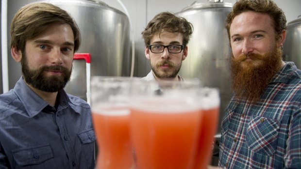 Kevin Hingston, Frazer Brown and Alan Ball with their new brew -'I'm Tracey Grimshaw and this is A Current Affair'.
