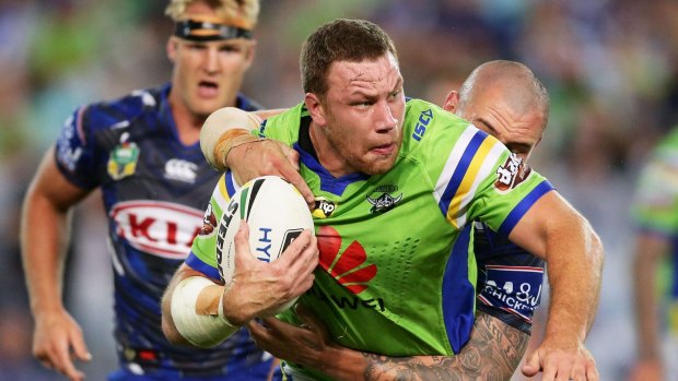 Tight battle: Shannon Boyd is wrapped up by David Klemmer.