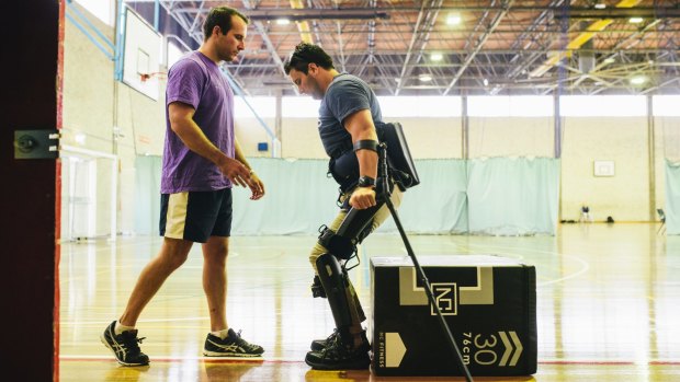 Canberra man Paul Jenkins is breaking ground for paraplegics across Australia trialling a new exoskeleton device.