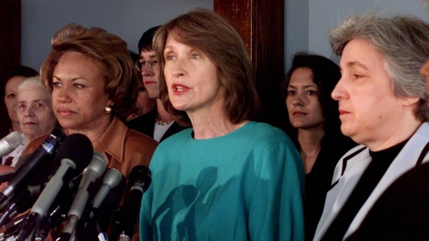 Then National Organisation for Women president Patricia Ireland, centre, calls on the Republican Congress to drop efforts to impeach Bill Clinton in 1998.