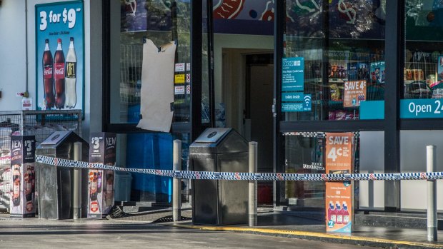 The Caltex service station where an employee was fatally stabbed remained cordoned off on Friday morning.