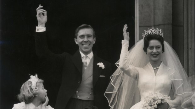 Princess Margaret and her bridegroom Antony Armstrong-Jones, also known as Lord Snowdon, as they wave from Buckingham Palace on May 6 1960.